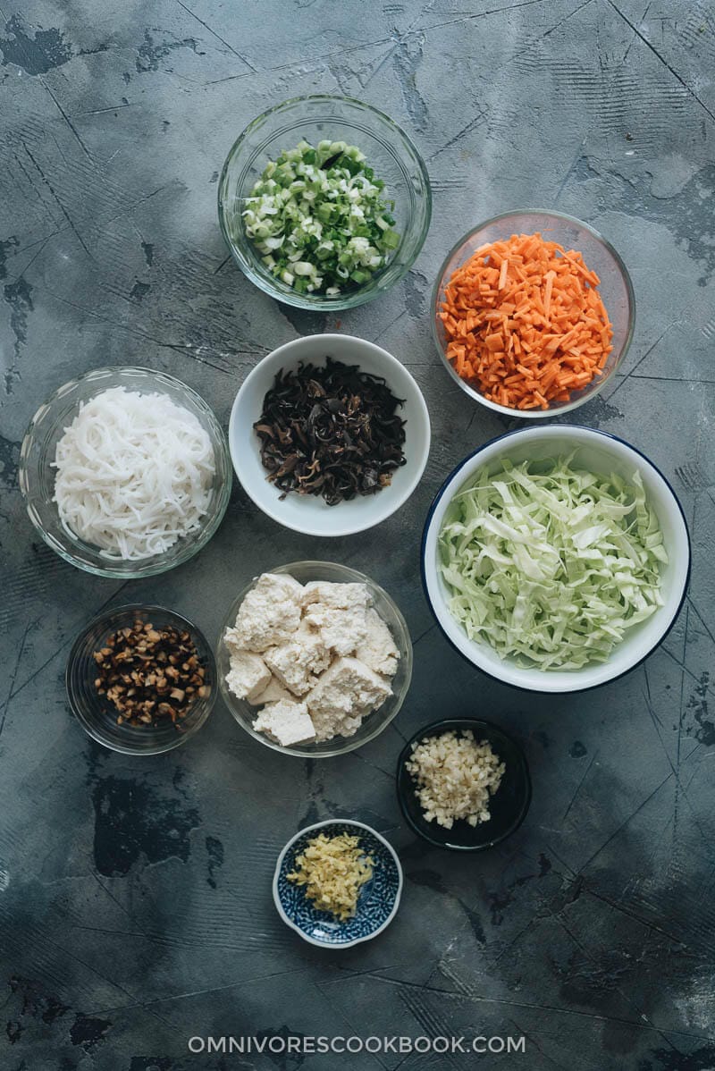 Homemade Vegan Dumplings - The dumpling filling has a well-balanced texture with veggies, tofu, and rice vermicelli. It’s seasoned with plenty of aromatics, soy sauce, and just a dash of curry powder to enhance its richness. #chinese #vegetarian Ingredients for making vegan dumplings