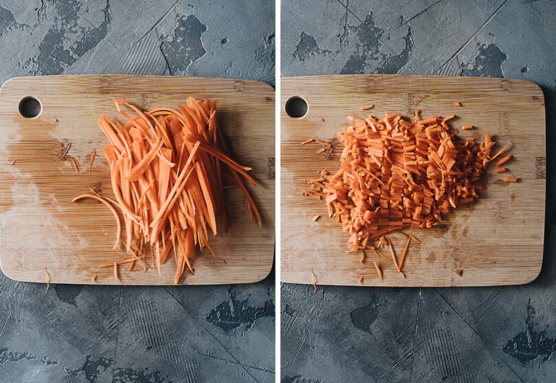 Homemade Vegan Dumplings - The dumpling filling has a well-balanced texture with veggies, tofu, and rice vermicelli. It’s seasoned with plenty of aromatics, soy sauce, and just a dash of curry powder to enhance its richness. #chinese #vegetarian Chopping carrots for making vegan dumplings