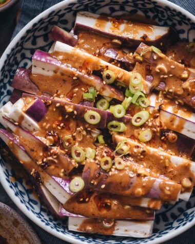Steamed eggplant in nutty sauce closeup