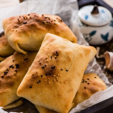 Baked Samosa - the moist and rich lamb onion filling is wrapped in a crispy crust. A great appetizer or party snack | omnivorescookbook.com