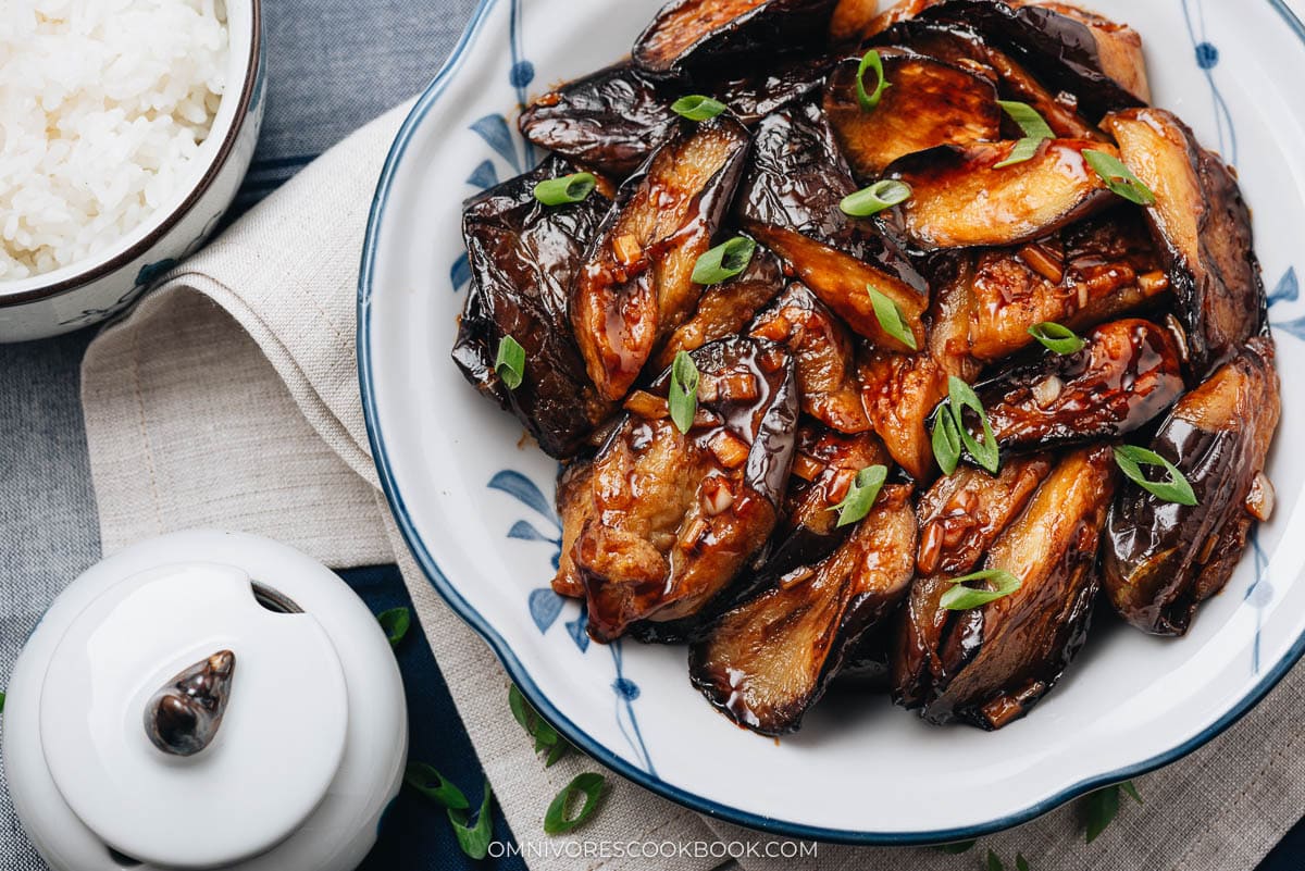 Chinese eggplant in garlic sauce served in a plate