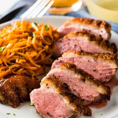 Pan Seared Duck Breast with Persimmon Grapefruit Sauce - With this combination you can create a luxurious fine dining experience in just 30 minutes | omnivorescookbook.com