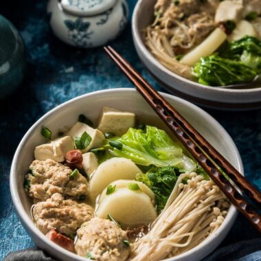 Napa Cabbage Soup with Tofu and Meatballs - Learn to cook the heartiest soup, plus two tips on how to quickly create a rich broth with just a few ingredients! | omnivorescookbook.com