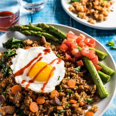 Peking duck fried rice tastes way better than takeout. Let me tell you a secret - you don’t need duck meat or a wok to cook this. | omnivorescookbook.com