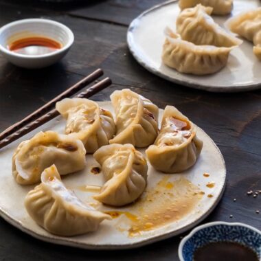 My mom’s secret recipe for creating the best pork dumplings. The dumplings are juicy, tender and taste so good even without any dipping sauce!
