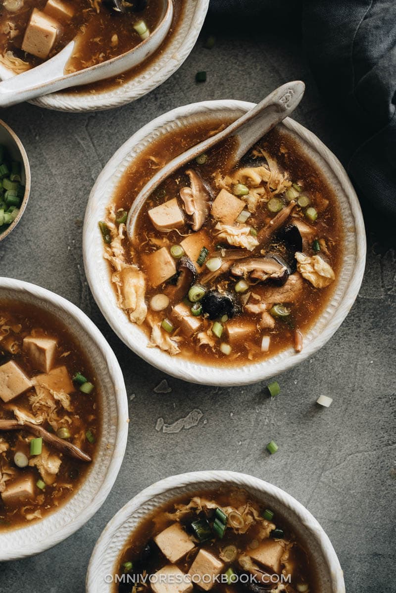 Hot and Sour Soup (酸辣汤) - Authentic Chinese restaurant-style hot and sour soup made easy. The hearty broth is loaded with veggies and is so satisfying and healthy. The recipe includes notes on how to tweak the soup into a vegetarian one and to use whatever veggies you have on hand. #takeout #recipes #traditional Easy hot and sour soup