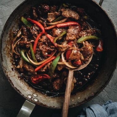 Szechuan beef stir fry in a pan
