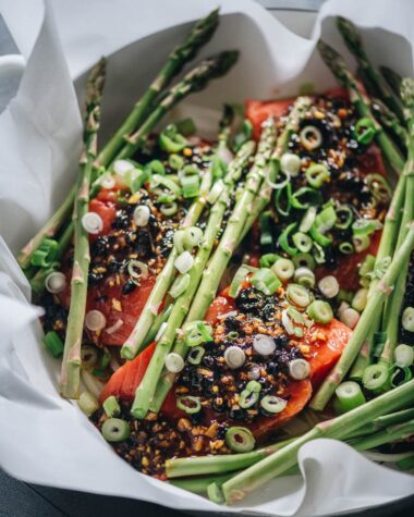 Making steamed salmon with black bean sauce close-up