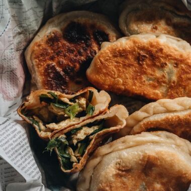 Chinese chive pockets cut open revealing the filling