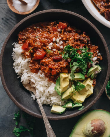 Chinese served over steamed rice with avocado and cilantro