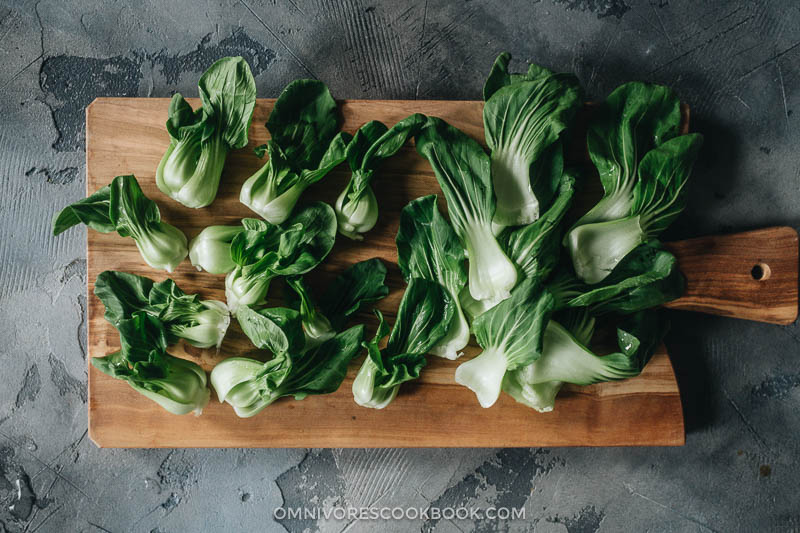 4-Ingredient Baby Bok Choy Stir Fry | Pair this quick and easy side dish with your favorite main and some steamed rice to complete a nutritious meal. This dish takes 15 minutes to whip together. The baby bok choy is cooked until tender, then soaked with a garlicky sauce that’s savory and lightly sweet. It’s such a great way to enjoy vegetables. {Vegan, Gluten-Free Adaptable} How to prepare baby bok choy for cooking