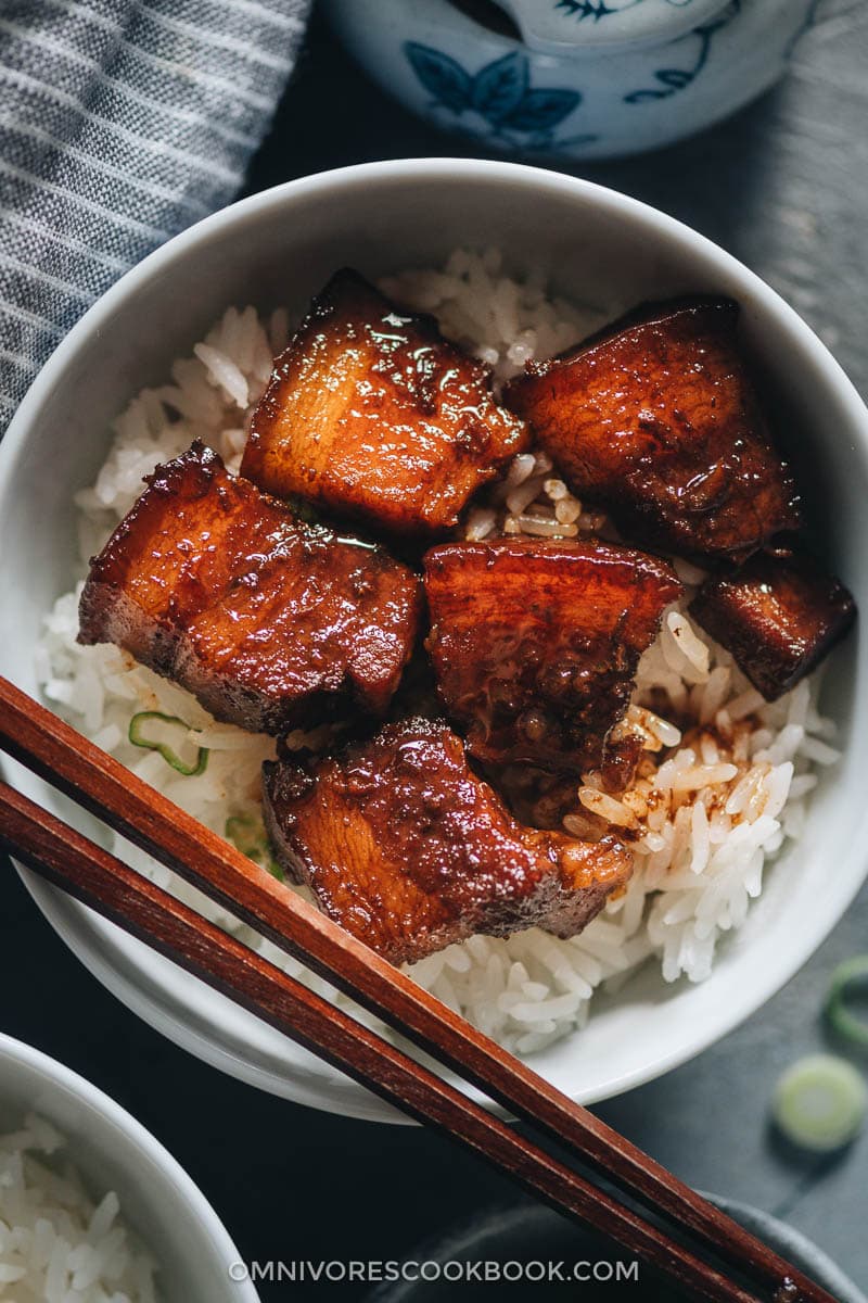 Hong Shao Rou | A Chinese classic. The tender, juicy pork is coated in a glossy sauce that is sticky, savory, sweet, and full of fragrance. It’s a perfect meal-prep dish to cook on a weekend and enjoy throughout the week. Hong shao rou served on steamed rice
