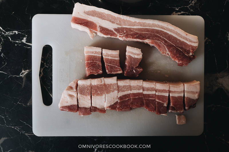 Hong Shao Rou | A Chinese classic. The tender, juicy pork is coated in a glossy sauce that is sticky, savory, sweet, and full of fragrance. It’s a perfect meal-prep dish to cook on a weekend and enjoy throughout the week. How to cut pork belly for braising