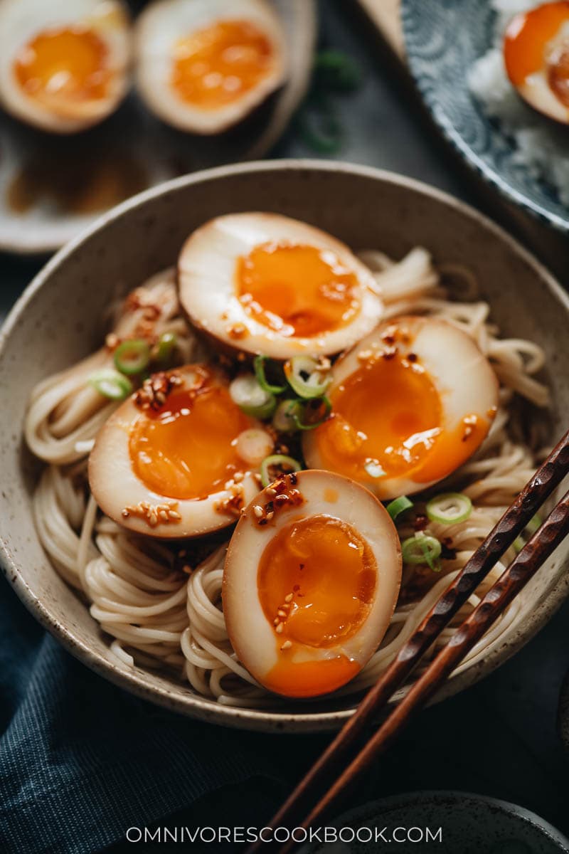 Marinated eggs on noodles with chili oil
