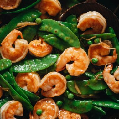 Stir fried shrimp with snow peas close up