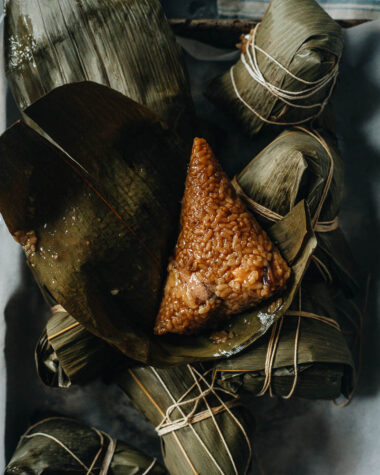 Savory zongzi on bamboo leaves