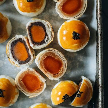 Modern mooncake with red bean and lotus seed paste and egg yolk