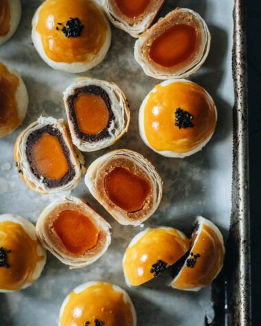 Modern mooncake with red bean and lotus seed paste and egg yolk