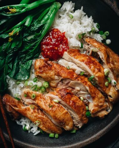 Salt baked chicken over rice with Chinese broccoli