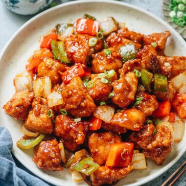 Sweet and sour chicken with pepper and onion