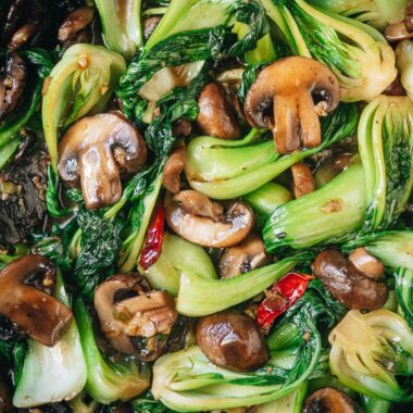 Baby bok choy and mushroom stir fry close up