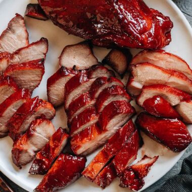 Carved air fryer char siu pork in a platter close up