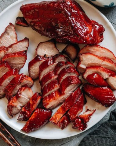 Carved air fryer char siu pork in a platter close up