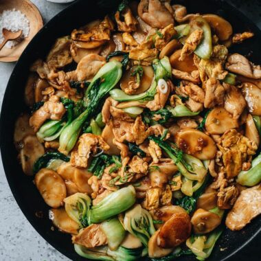 Rice cake stir fried with chicken, egg and baby bok choy