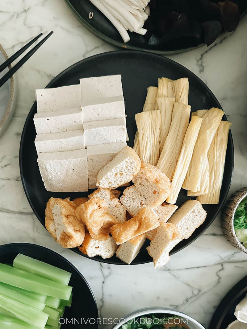 Sliced tofu, fried tofu puffs, and yuba sticks