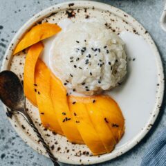 Mango sticky rice is a healthy and satisfying dessert featuring sweet gooey sticky rice served with a luscious coconut sauce and sliced mango.The homemade version contains less sugar and is quite easy to prepare. {Gluten-Free, Vegetarian, Vegan}