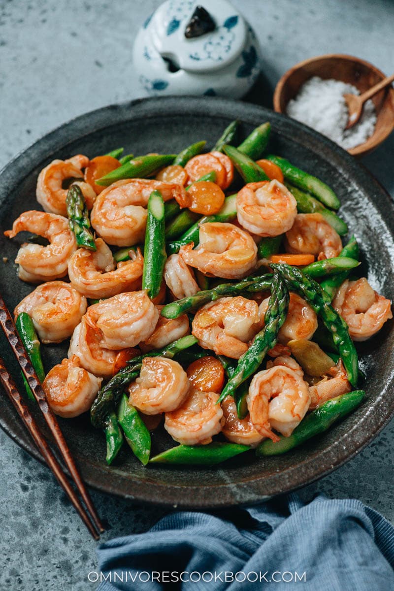 Shrimp and asparagus stir fry in a plate
