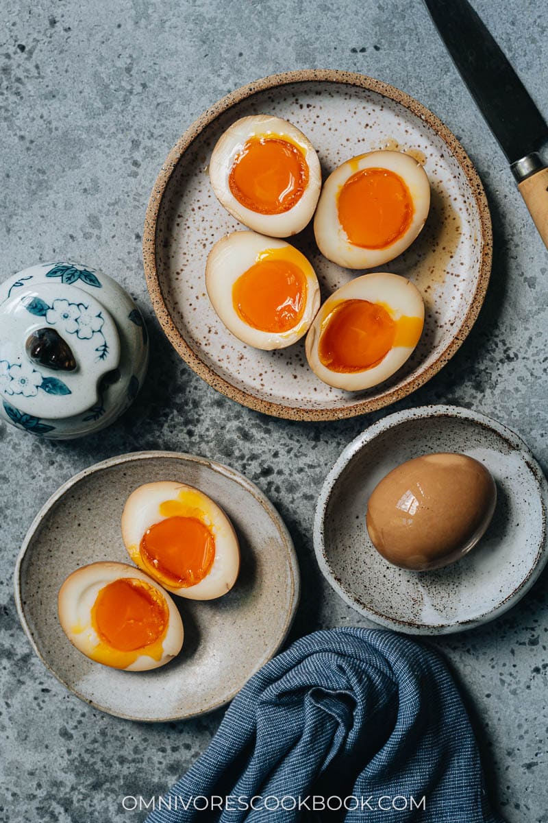 Sliced open marinated eggs