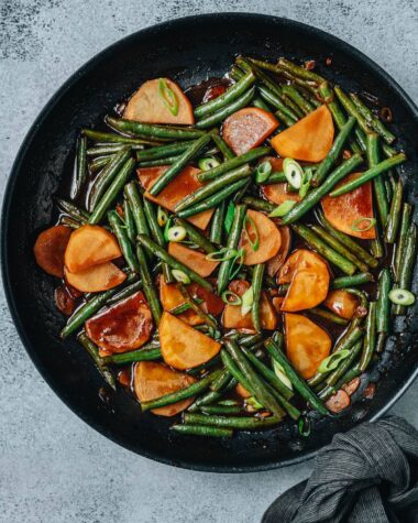 Chinese style green bean and potato stew in a pan