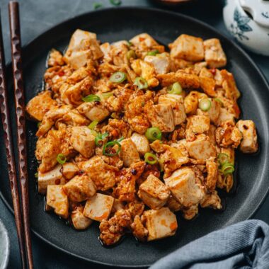 Egg and tofu stir fry served in a plate