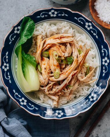 Shredded chicken breast with bok choy over rice