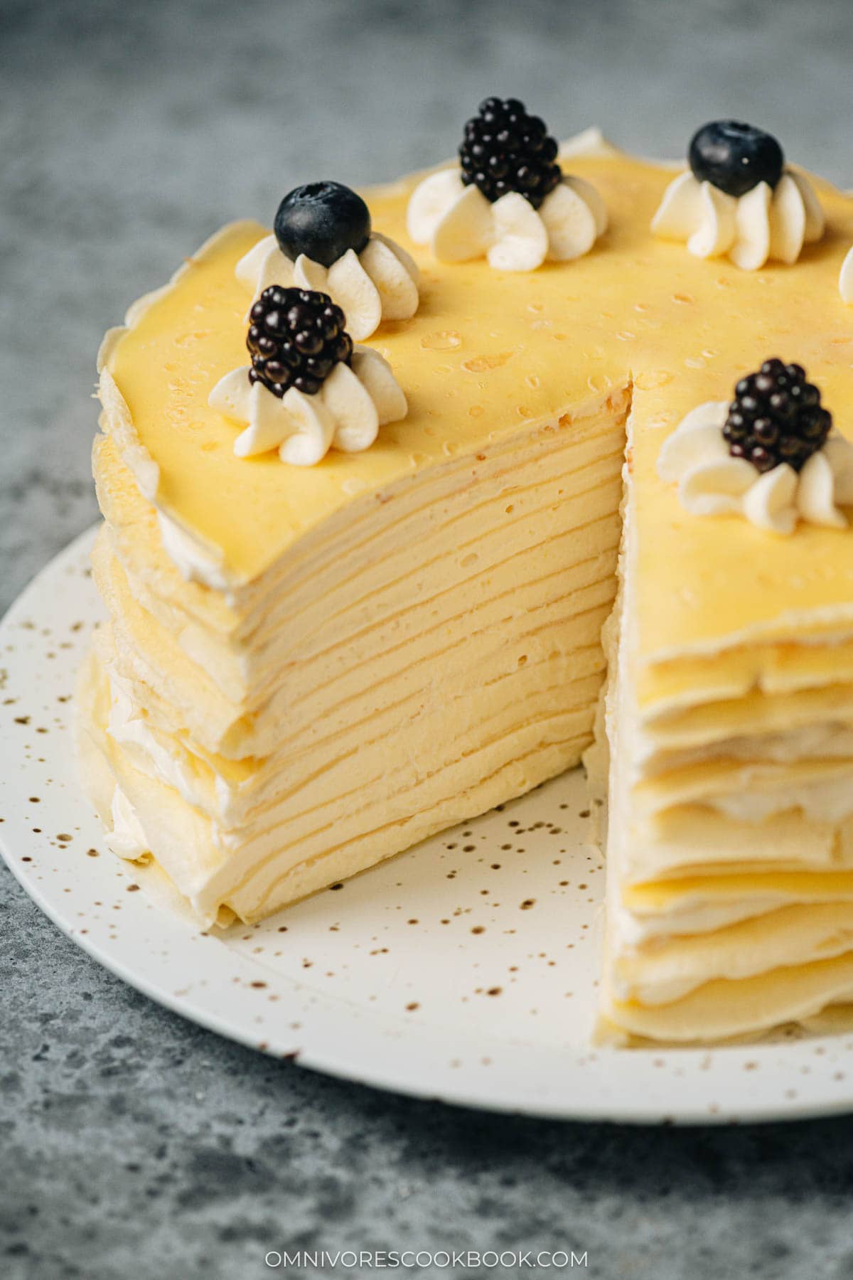 Crepe cake with a slice removed close up