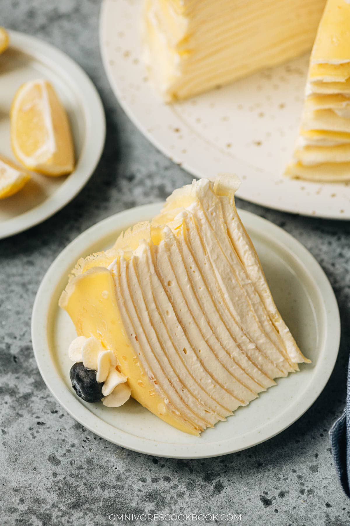 A slice of lemon curd cream crepe cake