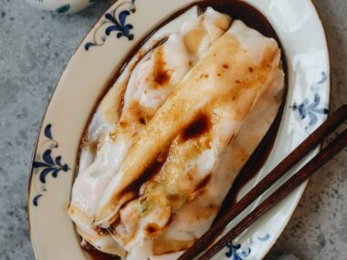 Homemade cheung fun with shrimp filling served on a plate