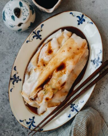 Homemade cheung fun with shrimp filling served on a plate