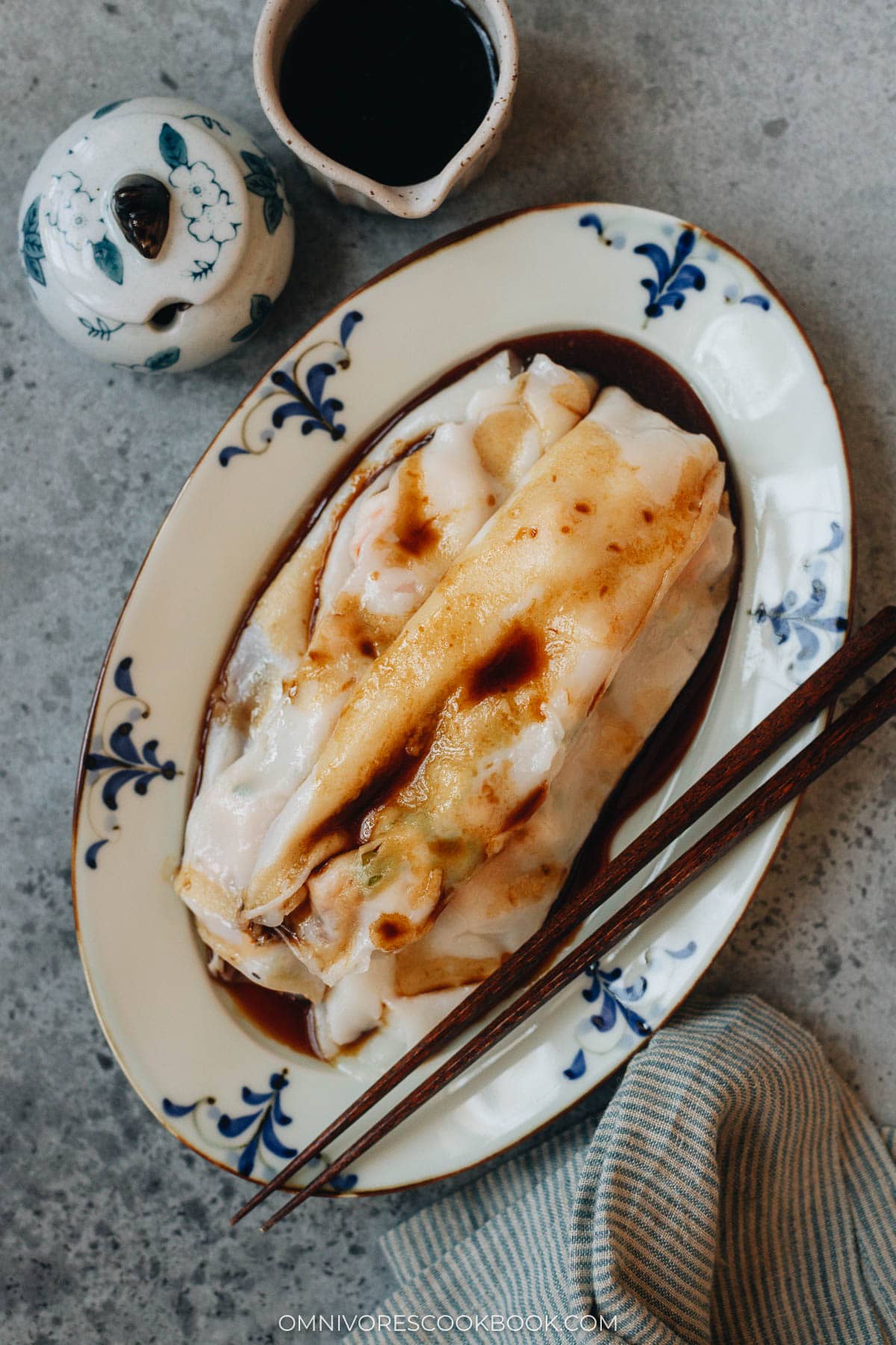 Homemade cheung fun with shrimp filling served on a plate