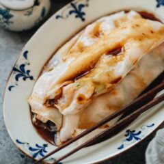 A cheung fun recipe that yields a very thin rice roll with a silky smooth texture, juicy shrimp, and an aromatic seasoned soy sauce that is just as good as the restaurant one. Replicate this dim sum favorite in your own kitchen by following my step-by-step photo and video guide.