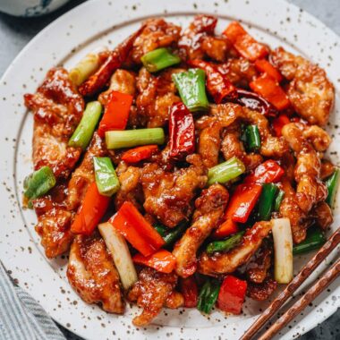 Mongolian chicken with pepper served in a plate close up