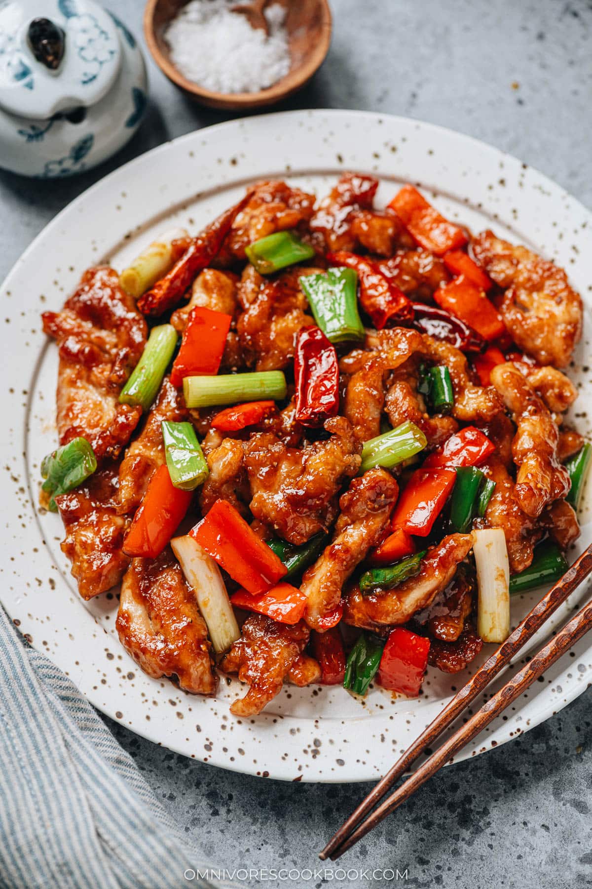 Mongolian chicken with pepper served in a plate close up
