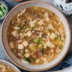 West Lake beef soup is a delicate and heart-warming dish that features tender beef, mushrooms, and tofu pieces made into a chicken broth based egg drop soup.