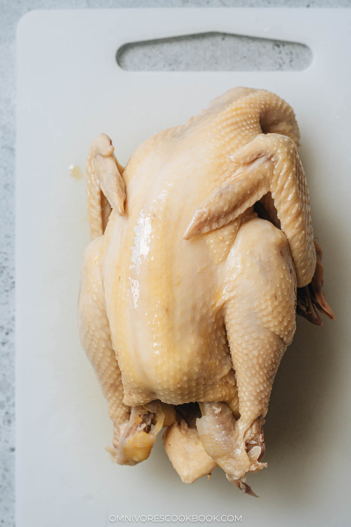 Cooked white cut chicken before carving