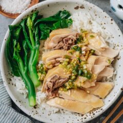 A white cut chicken recipe that produces juicy tender chicken with silky skin, served with a fragrant ginger scallion sauce. {Gluten-Free Adaptable}